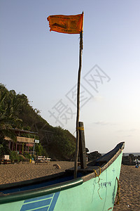 印度果阿岛印度沙滩上的老鱼船热带蓝色海滩海浪旅行海景港口孤独海岸线太阳图片