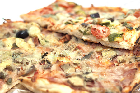 塞满披萨的切片口粮食物图片