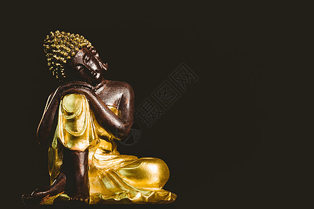 沉思者雕像伍德布德佛像金子塑像背景雕塑黑色雕像沉思宗教信仰冥想背景