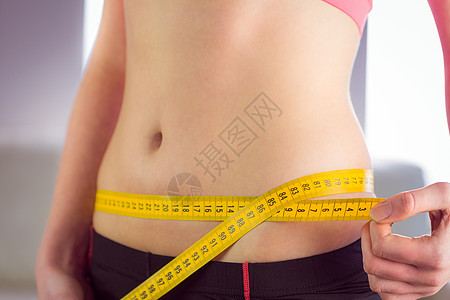 腰带宽度的山岳妇女公寓腰部重量数字饮食房子女性测量身体家庭图片