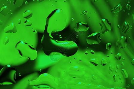 绿色抽象背景与水滴玻璃气泡雨滴珠子艺术飞沫宏观液体图片