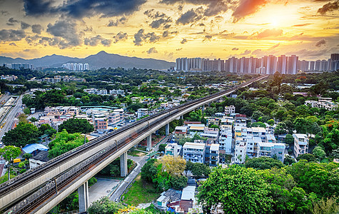 香港市中心市区和日落快车穿越卡车运输交通辉光曲线场景技术天线车道图片