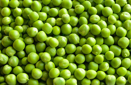 A 新鲜甜甜青豆 绿花椰子的背景宏观收成营养食物粮食种子农业水果团体饮食图片
