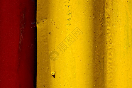 抽象的红色和黄色红色铁铁金属板海浪床单黑色毛皮大理石白色盘子金属失真阴影图片