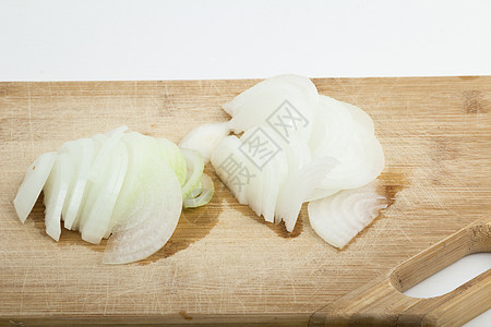 洋葱切片半圆蔬菜盘子砧板木头白色食物饮食图片