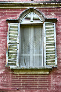 在米拉诺古老窗口的 红意大利兰巴迪石头窗户历史压缩雕塑建筑学宫殿村庄橙子玻璃图片