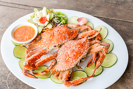 蒸螃蟹海鲜盘子食物绿色美食蒸汽红色烹饪桌子柠檬餐厅图片