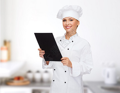 带黑白纸 微笑着的女厨师厨房食物房间面包师广告管理人员帽子助手女性服务图片