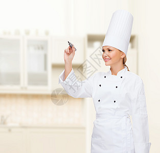 微笑的女厨师在空气中写作食谱餐厅管理人员助手房间美食服务女孩成人屏幕图片