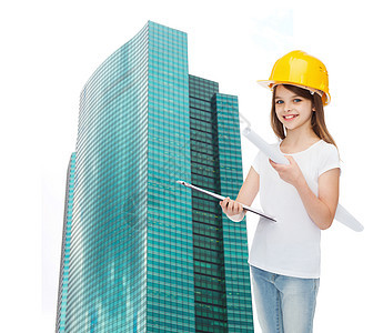 戴保护头盔的微笑小女孩职业专家摩天大楼工人蓝图绘画女孩草图建设者房子图片
