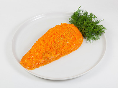 以胡萝卜形式呈现的沙拉盘子水果叶子花园蔬菜黄瓜食物陶器小枝白色图片