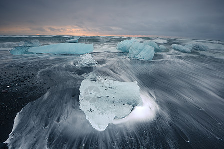 冰山海滩旅行海洋黑色海浪蓝色气候冰川火山天空白色图片