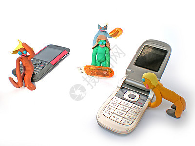 带手机和Usb闪光灯的塑料人数字家庭白色团体技术手工塑像玩具造型女孩黏土图片