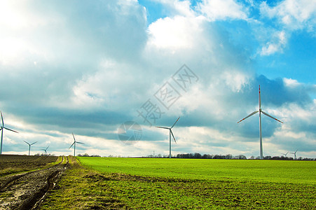 风车公用事业金属天空草地太阳活力发电机保护旋转涡轮图片