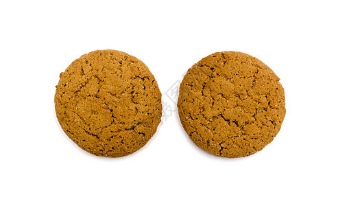 在白色背景上特写两个燕麦饼干糕点圆形营养食物产品照片早餐甜点小吃水平图片