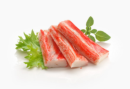Crab 棒模仿海鲜食物团体红色条纹生产绿色鱼糜蟹肉背景图片