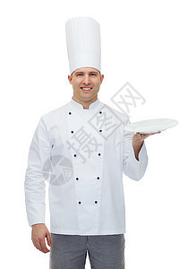 快乐的男厨师厨师 餐盘空空帽子职业餐厅夹克男人炊具首席转矩厨房美食图片