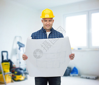 戴有蓝图的头盔的男性微笑建筑者工程师建筑修理工方案建设者职业草图安全帽维修建造图片
