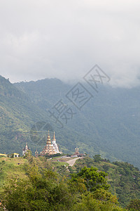 Watha 隐藏玻璃玻璃旅行寺庙艺术建筑森林建筑学天空佛教徒地标宝塔图片