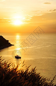 美丽的大自然 有日落的颜色岩石海滩太阳季节阳光海洋旅游风景阴影热带图片