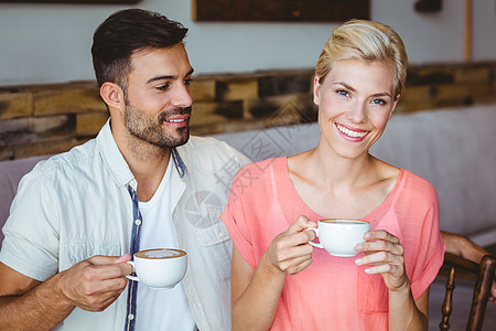 一对夫妇一起喝杯咖啡空闲餐厅快乐女性咖啡馆闲暇商业微笑顾客时间图片