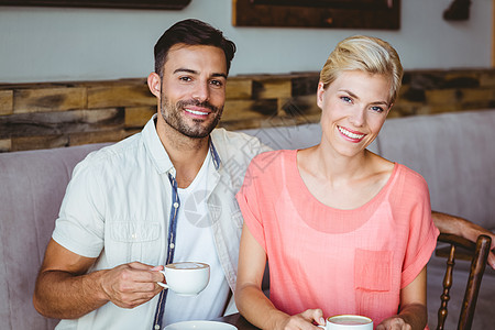 一对夫妇一起喝杯咖啡饮料咖啡屋微笑男人时间零售顾客咖啡店商业行业图片