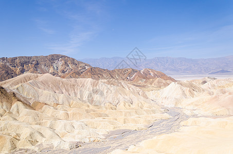死亡谷的Zabriskie点山脉侵蚀地质学公园风景水平荒地干旱黄色沙漠图片