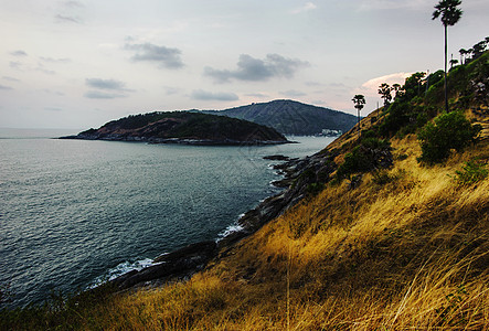 美丽自然日出岩石太阳风景阴影海浪海滩季节热带旅游图片