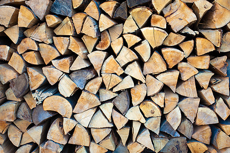 一堆原木圆圈烧伤燃料温暖林业树干日志国家活力木头图片