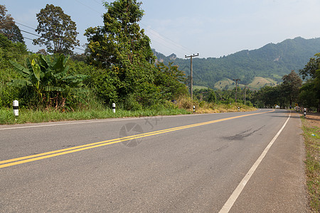 山区公路旅行曲线绿色山脉公园蓝色车道国家草地沥青图片