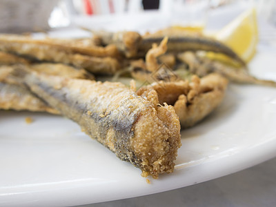 海鲜龙虾油炸沙丁鱼酒吧盘子柠檬海鲜菜单油炸营养食物桌布餐厅背景
