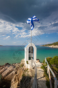 Greek 礼拜堂和海洋宗教文化天空海滩白色地平线场景蓝色建筑学旅行图片