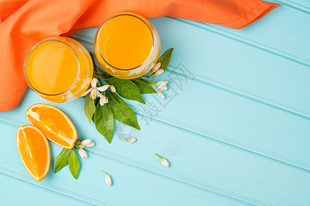 新鲜榨橙汁液体饮料橙子果汁生产营养桌子木头饮食水果图片