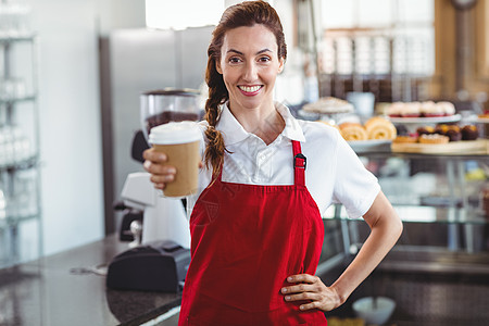 漂亮的咖啡厅 送走的杯子职业咖啡店食品工人雇主微笑女性外带员工饮料图片