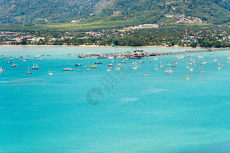 泰国普吉岛游船的视海和码头海岸海洋支撑旅行景点巡航热带风景海滩天空图片