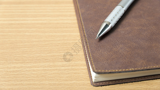 笔和笔卡片螺旋说谎杂志戒指客人笔记商业软垫桌子图片