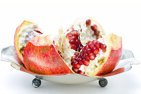 石榴热带农业种子小吃白色食物红色水果果汁情调图片