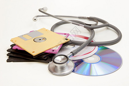 软盘磁盘 CD和听诊器图片