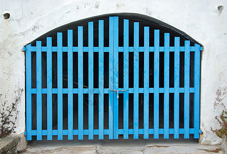 旧青木门建筑学蓝色框架石头入口木头庇护所青色图片