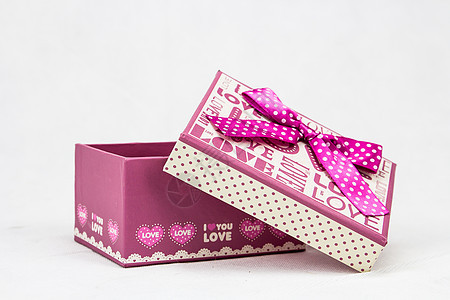 礼品盒礼品袋粉色盒子白色丝带展示内阁礼物创意浪漫背景图片
