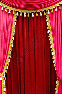 红色剧院幕布天鹅绒风格剧场纺织品窗帘文艺装饰娱乐演出舞台背景图片