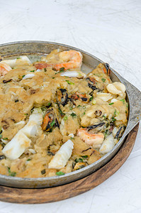 炒海鲜煎饼贝类文化美食章鱼蔬菜平底锅牡蛎饼子油炸午餐图片