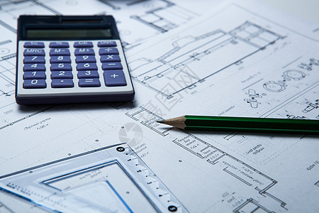 利用纸张和工具工作绘图建设设计师造型技巧计算建筑学桌面计算器图片