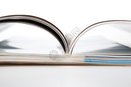 白色背景上的杂志堆叠集学习文学广告小说打印机构大学研究所页数学校图片