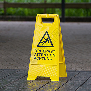 小心脚印在地板上安全警告酒店风险手表办公室黑色黄色冒险危险图片