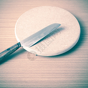 剪刀和切刀板的陈年风格金属厨师厨房烹饪屠夫棕色木板用具木头桌子图片