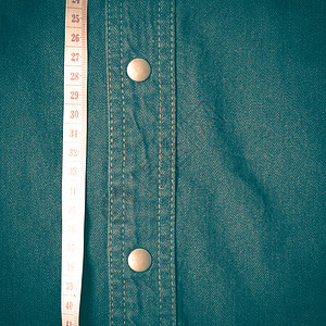 Time 磁带和 Jean 纹理回写风格牛仔布棉布黄色缝纫牛仔裤纺织品衣服腰部帆布测量图片