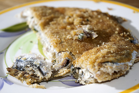 鱼肉馅饼美味胡椒蔬菜盘子糕点鳀鱼海鲜美食食物蛋糕图片