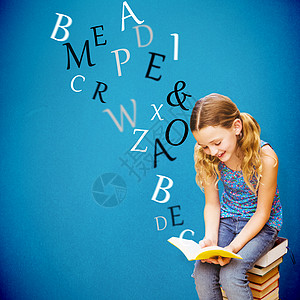 图书馆中可爱小女孩阅读书综合形象的合成图象浅色蓝色智力学校教科书女孩砖墙金发女郎字母教育性图片