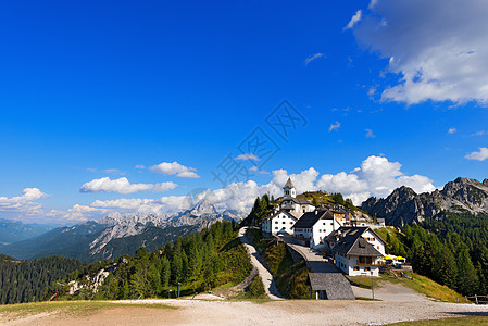 意大利塔尔维西奥宗教树木公园全景旅行高山天空历史建筑蓝色图片